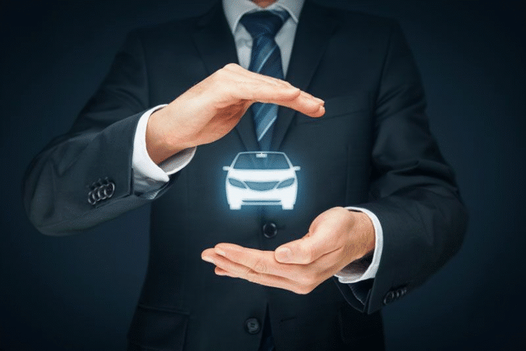 Businessperson cupping hands around glowing car icon on dark background.